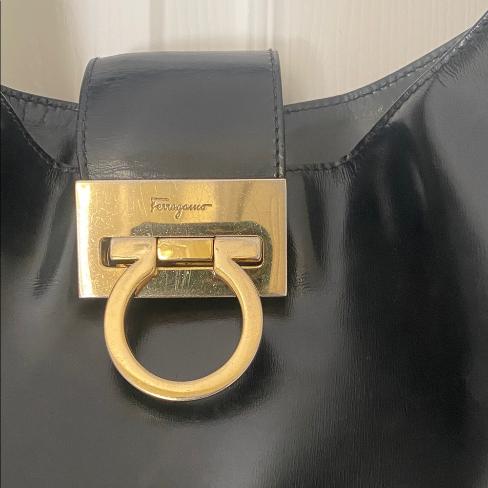 Salvatore Ferragamo Glossy Black Shoulder Bag with Gold Accent